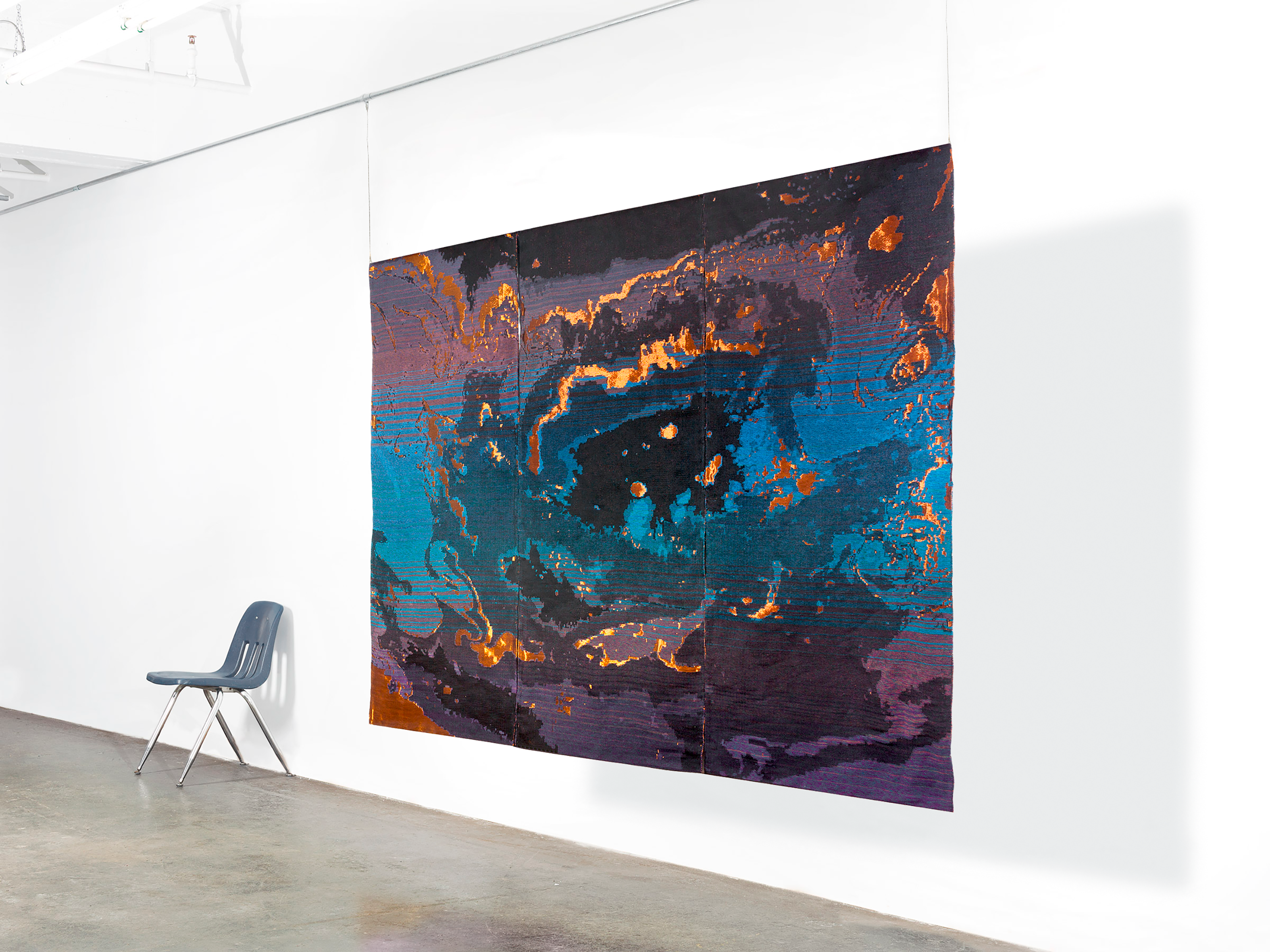 Figure 1: Ruth Beer, Oil Topography (2014). Hand-woven jacquard tapestry: copper wire, polyester, cotton, 218 x 305 x 1.5 cm. Photo courtesy of the artist.